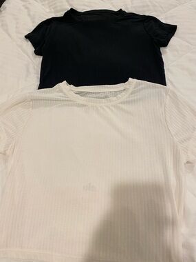Alo yoga tees 

2 quantity one black one cream